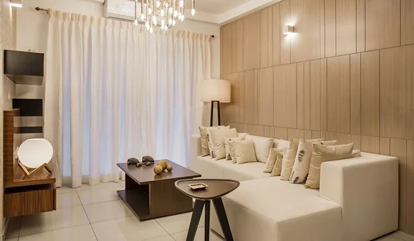 Representative impression of a naturally lit living room in an apartment
