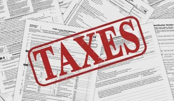 Tax documentation paperwork representing GST, stamp duty and registration charges applicable to an apartment purchase